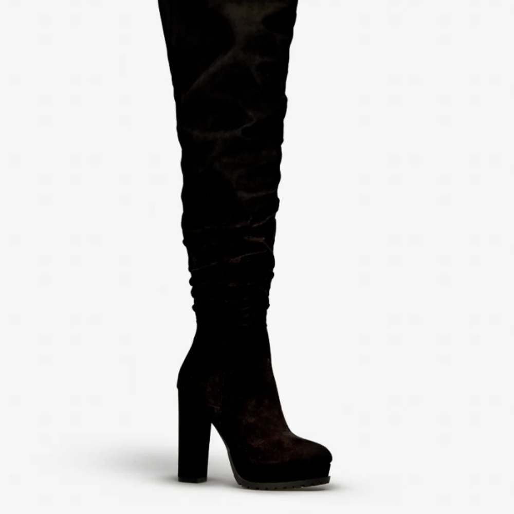 Thigh high black boots